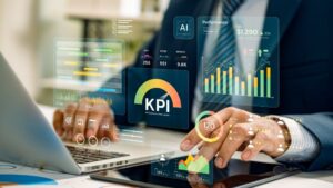 AI for Tech Leaders: Man analyzing KPIs and performance data on a tablet.
