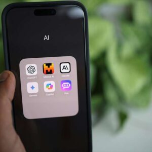 AI for Frontline End-users. Smartphone showing AI apps: ChatGPT, Mistral AI, Claude, Gemini, Copilot, and Poe.