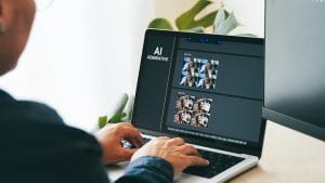 AI image generation on laptop. Man using AI generative tool. AI-created images.