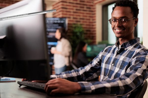 Six Sigma Black Belt candidate working at computer. CSSBB certification.